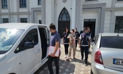 Hırsızlık zanlıları kucağında bebekle tutuklandı
